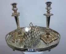 A pair of silver plated candlesticks, to