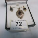 A 1970's garnet set in 9ct gold earrings