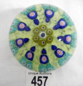 A Murano millefiori glass paperweight (approx. diameter 3" / 7.75cm)
 
Condition
Some scratches &