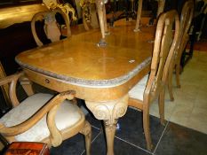 Birds Eye Maple extending dining table with 2 leaves and 6 chairs including 2 carvers
 
Condition