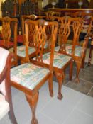 Set of six dining chairs including two carvers with ball-and-claw feet