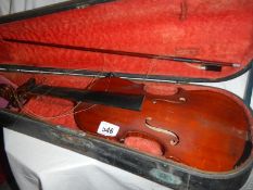 A French violin in case (approx. length of body 14" / 35.5cm, overall length 23" / 58.5cm)