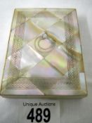 A Mother of Pearl purse (approx. 3 x 4" / 7.75 x 10.25cm)
 
Condition
Good condition with very