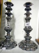 A Pair of heavy silver-plated candlesticks (approx. height 12" / 30.5cm)
