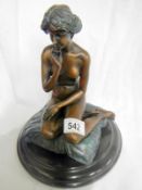 20th-century bronze of nude lady seated
