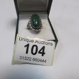 A malacite ring set in silver and in the