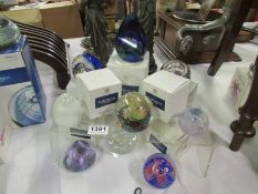 7 boxed and 2 unboxed Caithness glass paperweights
Condition 
4 have chips