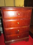 A mahogany bedside chest