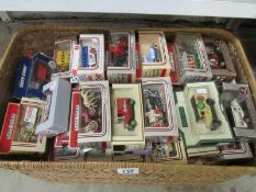 A box of boxed die cast vehicles