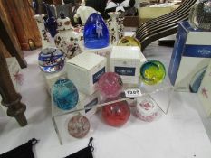 7 boxed and 2 unboxed Caithness glass paperweights
Condition
Pink weight has chip
Some weights