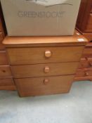 A teak 3 drawer chest