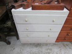 A painted 4 drawer chest