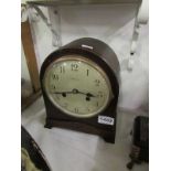 A dome top Edwardian mantel clock with p