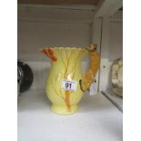 A Burleigh ware squirrell jug