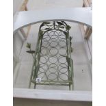 A metal 'floral' 20 bottle wine rack