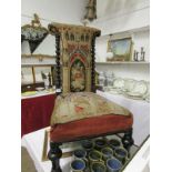 A Victorian nursing chair with tapestry seat and back