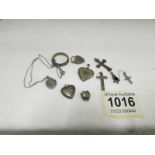 A mixed lot of silver lockets, crosses etc