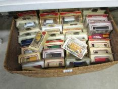 A large box of boxed die cast vehicles