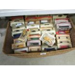 A large box of boxed die cast vehicles