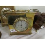 A Smith's car clock in brass case