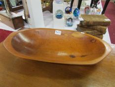 A wooden fruit bowl