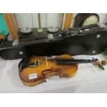 A cased Lark violin