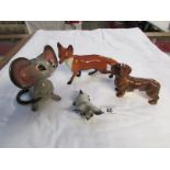 A large Beswick fox a/f, an unmarked Bes