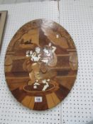 An oval inlaid Oriental panel