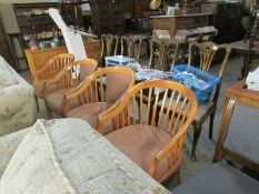 A set of 4 elbow chairs