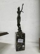 A bronze nude dancing lady figurine on m