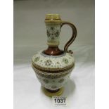 A Mettlach carafe, missing original stopper