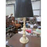 A painted table lamp with shade