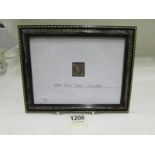 A framed and glazed 1840 penny black in fine used condition