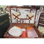 A picnic hamper and contents