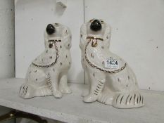 A pair of Staffordshire spaniels