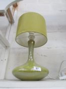 A retro style green pottery table lamp