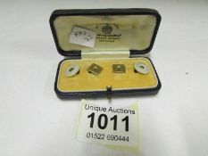 2 pairs of cased gold studs