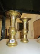 A pair of brass Edwardian Oriental vases