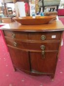 A mahogany bow front 2 drawer over 2 doo