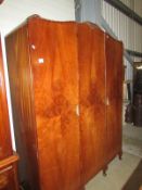 A large mahogany wardrobe