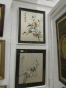 A pair of Oriental silk pictures, both s