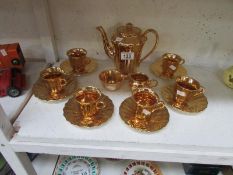 A gilded coffee set