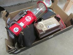 A box of miscellaneous including radio, dominoes etc.
Condition
Items include: model toy petrol