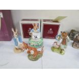 2 boxed Royal Albert Beatrix Potter figurines, a Royal Doulton Kanga and Roo and one other figure