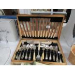 A boxed cutlery set