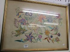 A framed and glazed embroidery