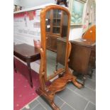 A Victorian mahogany cheval mirror
Condition
Some signs of wear with scuffing & slight veneer loss