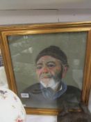 A pastel portrait of a fisherman with beard