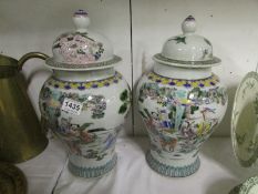 A pair of large Oriental ginger jars