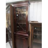 An astragal glazed display cabinet